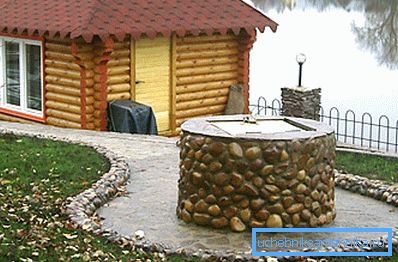 Foto de un pozo de piedra. Foto de un pozo de piedra.