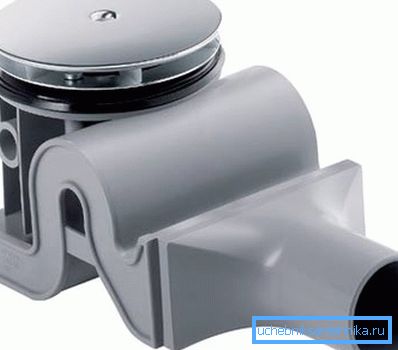Foto de un sifón de ducha modelo compacto. Foto de un modelo compacto de un sifón de ducha.