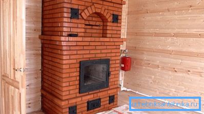 Foto de una estufa de chimenea moderna. Foto de una estufa de chimenea moderna.