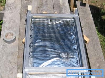 En la foto - colector solar casero. En la foto - colector solar casero.