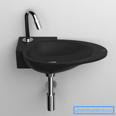 En la foto - un mini lavabo angular CLOU En la foto - un mini lavabo angular CLOU
