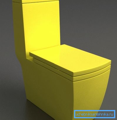 En la foto: un inodoro amarillo puede ser un excelente complemento para el interior en colores oscuros. En la foto: un inodoro amarillo puede ser un excelente complemento para el interior en colores oscuros.