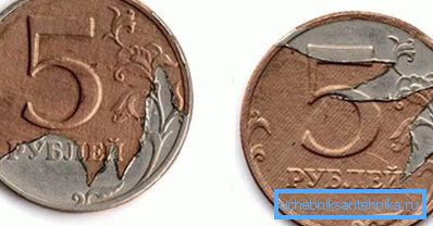 Capa de revestimiento roto en una moneda de 5 rublos. Capa de revestimiento roto en una moneda de 5 rublos.
