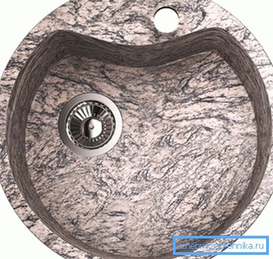 El fregadero circular de la esquina para la cocina de granito asume una disposición desplazada del mezclador para la mayor comodidad El fregadero circular de la esquina para la cocina de granito asume una disposición desplazada del mezclador para la mayor comodidad